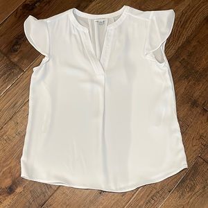 NWOT women’s V-neck blouse, size small. Perfect condition, never worn.